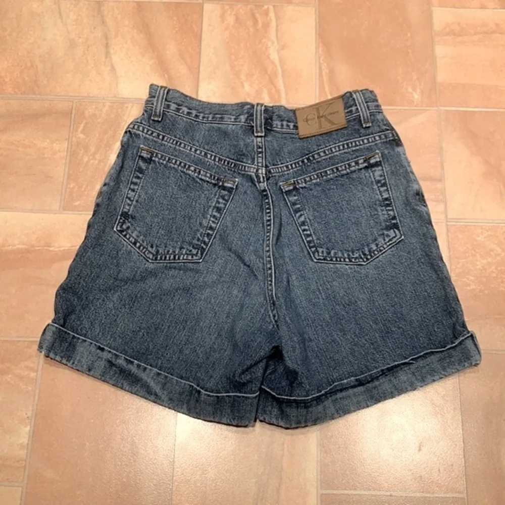 Calvin Klein Women's Blue High Waisted Medium Wash Denim Jean Shorts